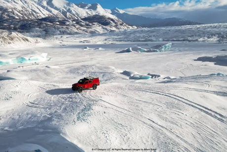 Adam Rubin in Red Jeep Gladiator in Alaska